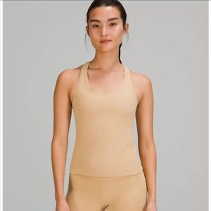 Lululemon Nulu tank top in tan. Never worn. Size 8